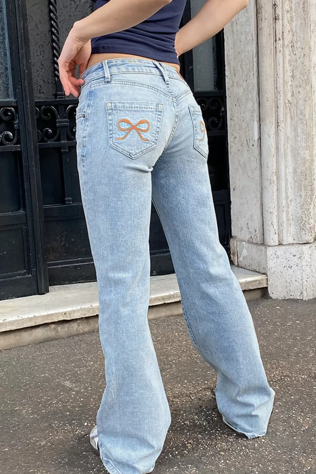 Shop Low waist flared jeans Graphics | Denim